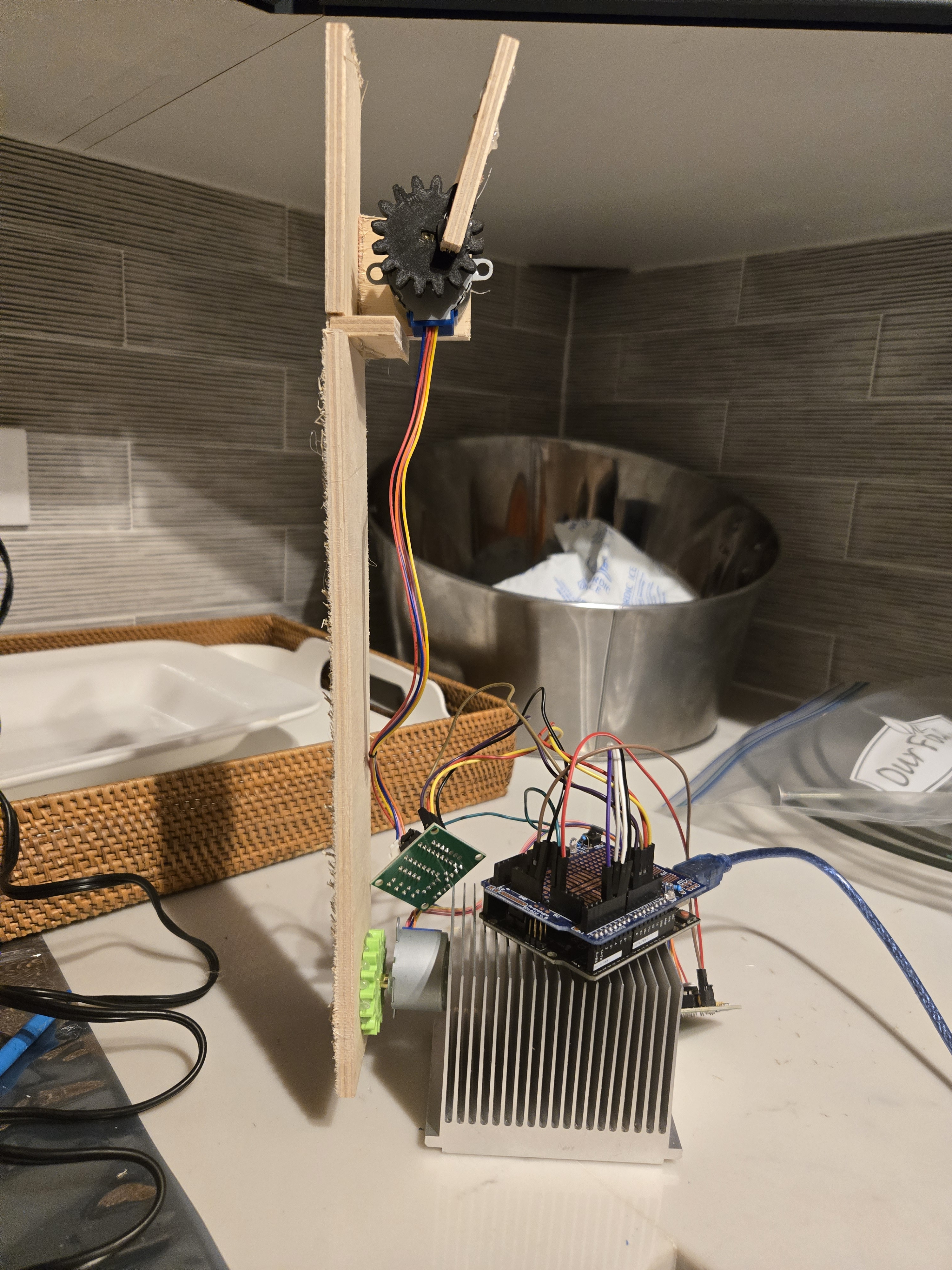 Image of a robotic arm made with plywood